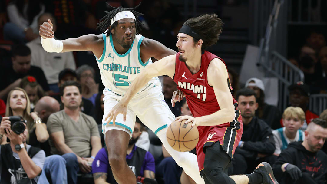 Charlotte Hornets center Mark Williams defends Miami Heat guard Jaime Jaquez Jr. during the first half at Kaseya Center.
