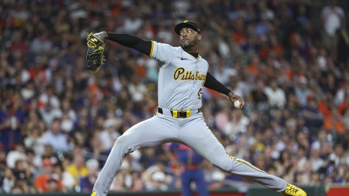 Jul 29, 2024; Houston, Texas, USA; Pittsburgh Pirates relief pitcher Aroldis Chapman (45) delivers a pitch during the eighth inning against the Houston Astros at Minute Maid Park. Mandatory Credit: Troy Taormina-USA TODAY Sports