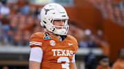Dec 21, 2024; Austin, Texas, USA; Texas Longhorns quarterback Quinn Ewers (3) against the Clemson Tigers during the CFP National playoff first round at Darrell K Royal-Texas Memorial Stadium. Mandatory Credit: Mark J. Rebilas-Imagn Images