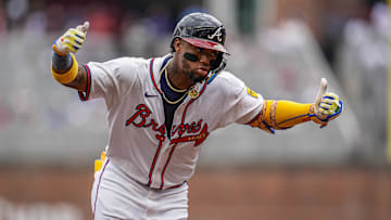 Jun 5, 2025; Cumberland, Georgia, USA; Atlanta Braves right fielder Ronald Acuna Jr (13) reacts after hitting a home run against the Arizona Diamondbacks during the sixth inning at Truist Park. Mandatory Credit: Dale Zanine-Imagn Images