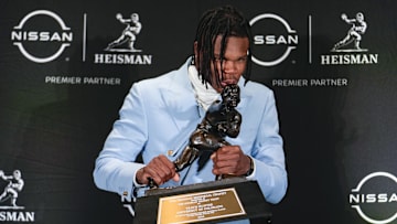 Dec 14, 2024; New York, NY, USA; Colorado Buffaloes wide receiver/cornerback Travis Hunter poses for a photo after winning the Heisman Trophy award during the 2024 Heisman Trophy Presentation. Mandatory Credit: Lucas Boland-Imagn Images
