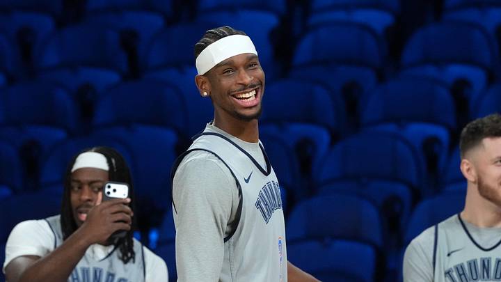 Dec 12, 2025; Las Vegas, NV, USA; Oklahoma City Thunder guard Luguentz Dort (5), guard Shai Gilgeous-Alexander (2) and center Isaiah Hartenstein (55) react during practice prior to the Emirates Cup semifinals at T-Mobile Arena. Mandatory Credit: Kirby Lee-Imagn Images