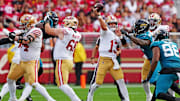 Sep 28, 2025; Santa Clara, California, USA; San Francisco 49ers quarterback Brock Purdy (13) makes a pass during the second half against the Jacksonville Jaguars at Levi's Stadium. Mandatory Credit: Darren Yamashita-Imagn Images