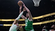 May 7, 2025; Boston, Massachusetts, USA; Boston Celtics center Luke Kornet (40) grabs the rebound against New York Knicks guard Josh Hart (3) in the second quarter during game two of the second round for the 2025 NBA Playoffs at TD Garden. Mandatory Credit: David Butler II-Imagn Images