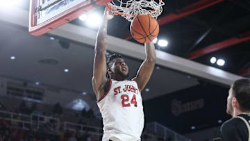 Dec 11, 2024; Queens, New York, USA;  St. John's basketball forward Zuby Ejiofor (24) dunks in the second half against the Bryant University Bulldogs at Carnesecca Arena.