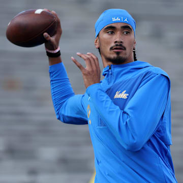 Sep 12, 2025; Pasadena, California, USA;  UCLA Bruins quarterback Nico Iamaleava (9) warms up before the game against the New Mexico Lobos at Rose Bowl. Mandatory Credit: Kiyoshi Mio-Imagn Images