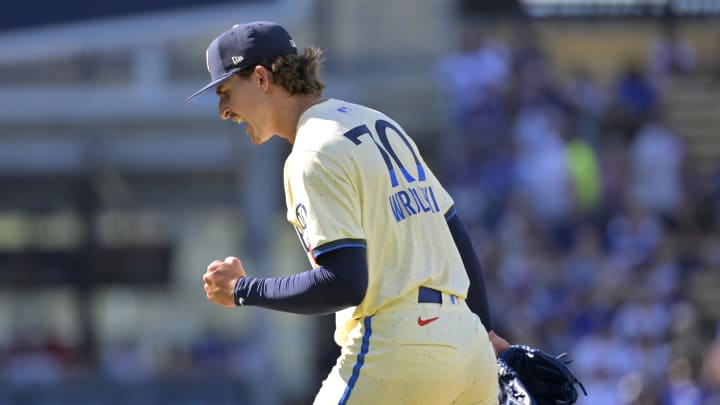 Jul 20, 2024; Los Angeles, California, USA;  Los Angeles Dodgers starting pitcher Justin Wrobleski (70) pumps his fist after a strike out to end the fourth inning against the Boston Red Sox at Dodger Stadium. Mandatory Credit: Jayne Kamin-Oncea-USA TODAY Sports