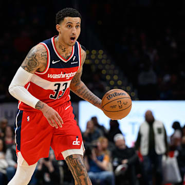 Mar 29, 2024; Washington, District of Columbia, USA; Washington Wizards forward Kyle Kuzma (33) brings the ball up court against the Detroit Pistons during the second quarter at Capital One Arena. Mandatory Credit: Reggie Hildred-Imagn Images