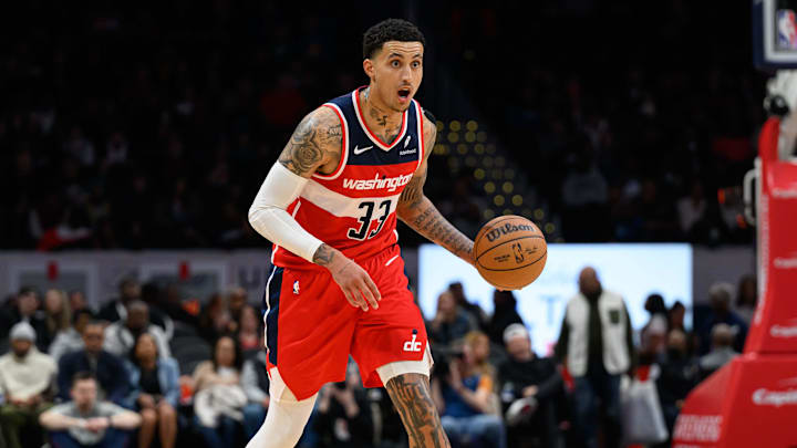 Mar 29, 2024; Washington, District of Columbia, USA; Washington Wizards forward Kyle Kuzma (33) brings the ball up court against the Detroit Pistons during the second quarter at Capital One Arena. Mandatory Credit: Reggie Hildred-Imagn Images