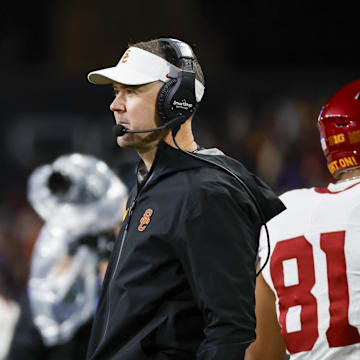 Nov 2, 2024; Seattle, Washington, USA; USC Trojans head coach Lincoln Riley stands on the sideline during the fourth quarter against the Washington Huskies at Alaska Airlines Field at Husky Stadium. Mandatory Credit: Joe Nicholson-Imagn Images