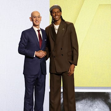 Jun 26, 2024; Brooklyn, NY, USA; Cody Williams poses for photos with NBA commissioner Adam Silver after being selected in the first round by the Utah Jazz in the 2024 NBA Draft at Barclays Center. Mandatory Credit: Brad Penner-Imagn Images