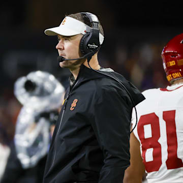 Nov 2, 2024; Seattle, Washington, USA; USC Trojans head coach Lincoln Riley stands on the sideline during the fourth quarter against the Washington Huskies at Alaska Airlines Field at Husky Stadium. Mandatory Credit: Joe Nicholson-Imagn Images