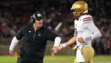 Sep 13, 2025; Stanford, California, USA; Boston College Eagles head coach Bill O'Brien (left) congratulates quarterback Dylan Lonergan (right) during the second quarter against the Stanford Cardinal at Stanford Stadium. Mandatory Credit: Darren Yamashita-Imagn Images