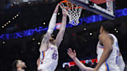 Oct 28, 2025; Oklahoma City, Oklahoma, USA; Oklahoma City Thunder center Isaiah Hartenstein (55) dunks off a rebound from Sacramento Kings during the second half at Paycom Center. Mandatory Credit: Alonzo Adams-Imagn Images
