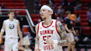 Feb 17, 2025; Salt Lake City, Utah, USA; Utah Utes guard Gabe Madsen (55) warms up before the game against the Kansas State Wildcats at Jon M. Huntsman Center. Mandatory Credit: Rob Gray-Imagn Images