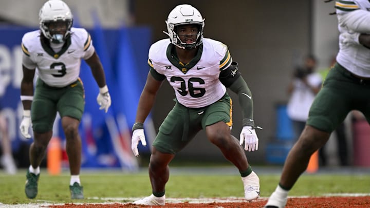Sep 6, 2025; Dallas, Texas, USA; Baylor Bears linebacker Travion Barnes (36) drops into coverage during the game between the SMU Mustangs and the Baylor Bears at Gerald J. Ford Stadium. Mandatory Credit: Jerome Miron-Imagn Images