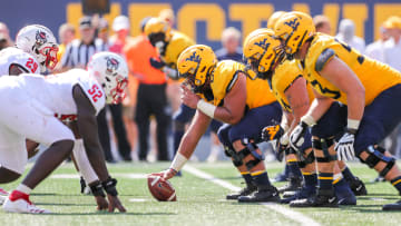 West Virginia Mountaineers offensive lineman Briason Mays (68)