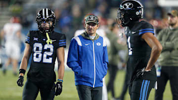 A-Rod standing on the sideline with his receivers.