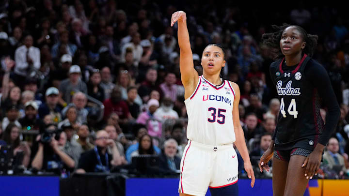 Connecticut guard Azzi Fudd (35) makes a three-pointer against South Carolina at Mortgage Matchup Center during the Women's Final Four in Phoenix on April 3, 2026.