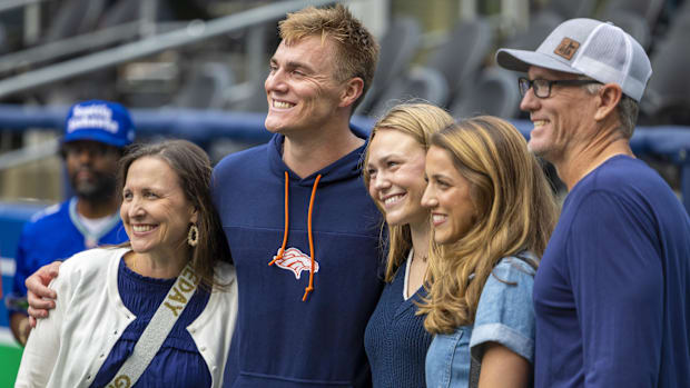 Denver Broncos quarterback Bo Nix (10, second from left) poses for a photo during warmups against the Seattle Seahawks.