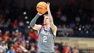 Nov 28, 2025; San Diego, CA, USA; Texas Christian University Horned Frogs guard Brock Harding (2) shoots the ball against the Wisconsin Badgers during the second half at Jenny Craig Pavilion. Mandatory Credit: Abe Arredondo-Imagn Images
