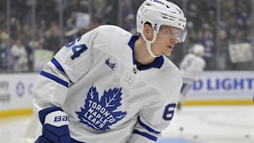Mar 29, 2025; Los Angeles, California, USA;  Toronto Maple Leafs center David Kampf (64) warms up prior to the game against the Los Angeles Kings at Crypto.com Arena. Mandatory Credit: Jayne Kamin-Oncea-Imagn Images