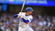 Apr 2, 2025; Los Angeles, California, USA; Los Angeles Dodgers shortstop Mookie Betts (50) bats during the first inning against the Atlanta Braves at Dodger Stadium. Mandatory Credit: Gary A. Vasquez-Imagn Images