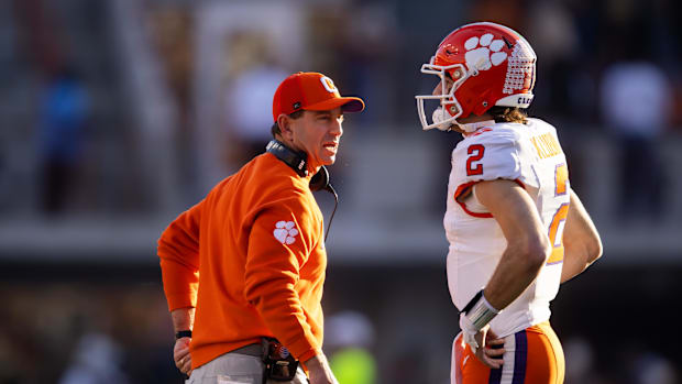 Clemson Tigers head coach Dabo Swinney with quarterback Cade Klubnik (2)