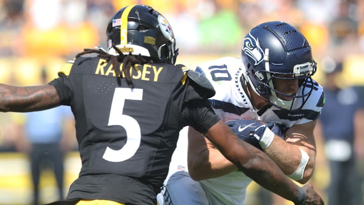 Sep 14, 2025; Pittsburgh, Pennsylvania, USA; Seattle Seahawks wide receiver Cooper Kupp (10) runs after a catch as Pittsburgh Steelers cornerback Jalen Ramsey (5) defends during the third quarter at Acrisure Stadium. Mandatory Credit: Charles LeClaire-Imagn Images Sep 14, 2025; Pittsburgh, Pennsylvania, USA; Seattle Seahawks wide receiver Cooper Kupp (10) runs after a catch as Pittsburgh Steelers cornerback Jalen Ramsey (5) defends during the third quarter at Acrisure Stadium. Mandatory Credit: Charles LeClaire-Imagn Images