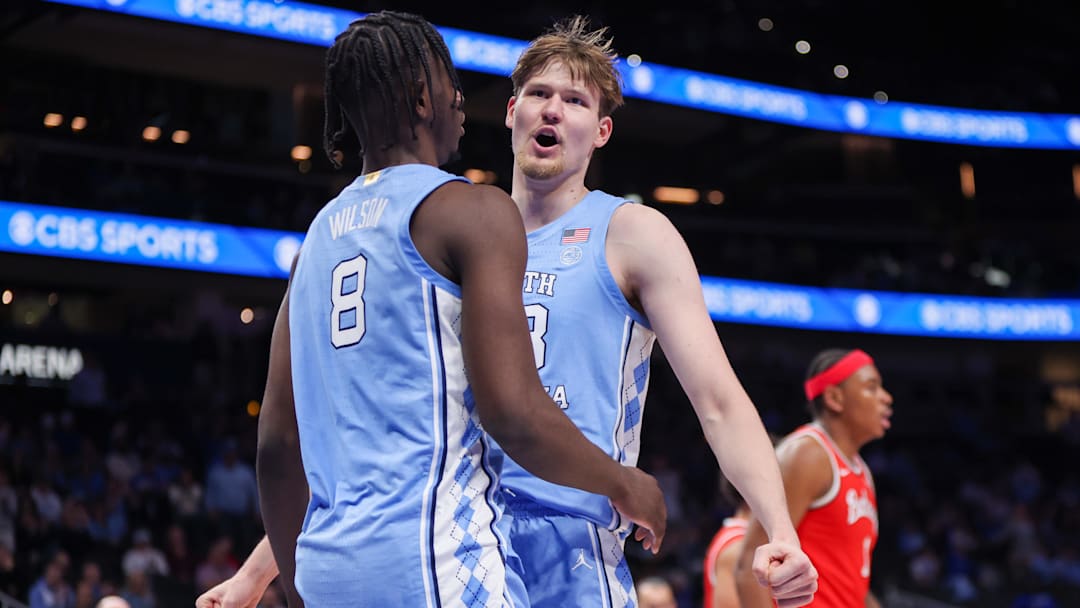 North Carolina Tar Heels forward Caleb Wilson (8) and center Henri Veesaar (13)