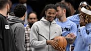 Memphis Grizzlies guard Ja Morant continues to heal from a calf strain that has kept him out for weeks, but a return is getting closer, sparking potential trade rumors as his future could lie elsewhere.