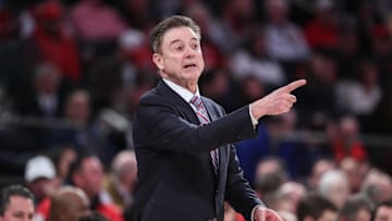 Feb 1, 2025; New York, New York, USA;  St. John's basketball head coach Rick Pitino signals to the team in the first half against the Providence Friars at Madison Square Garden. 