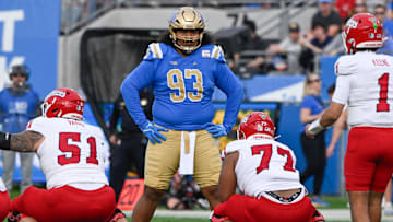 Nov 30, 2024; Pasadena, California, USA; UCLA Bruins defensive lineman Jay Toia (93) during the second quarter against the Fresno State Bulldogs at Rose Bowl. Mandatory Credit: Robert Hanashiro-Imagn Images