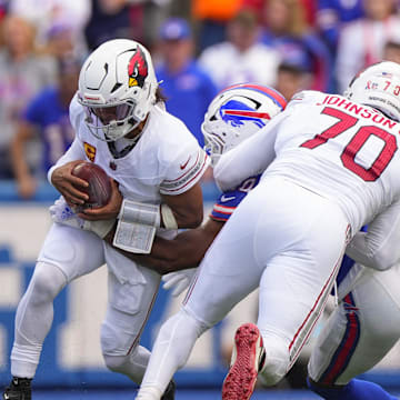 Sep 8, 2024; Orchard Park, New York, USA; Arizona Cardinals quarterback Kyler Murray (1) gets sacked by a Buffalo Bills defender during the second half at Highmark Stadium. Mandatory Credit: Gregory Fisher-Imagn Images