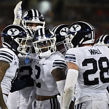 Sep 6, 2024; Dallas, Texas, USA; Brigham Young Cougars cornerback Marque Collins (2) celebrates with his teammates after he intercepts a pass during the second half against the Southern Methodist Mustangs at Gerald J. Ford Stadium. 