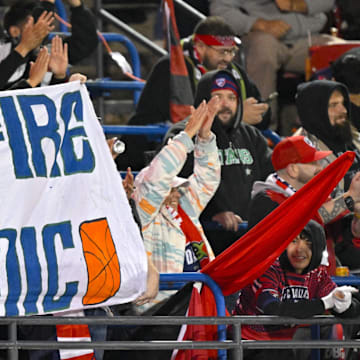 Mar 8, 2025; Frisco, Texas, USA; FC Dallas fans hold up a Fire Nico sign for Dallas Mavericks general manager Nico Harrison during the first half of the game between FC Dallas and Chicago Fire at Toyota Stadium. Mandatory Credit: Jerome Miron-Imagn Images