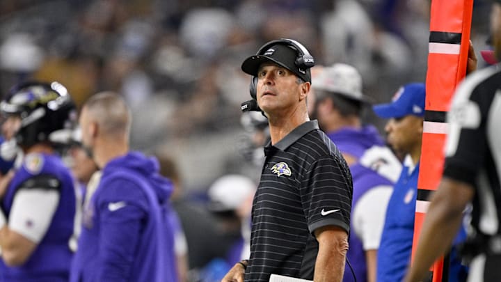 Aug 16, 2025; Arlington, Texas, USA; Baltimore Ravens head coach John Harbaugh looks on during the second half against the Dallas Cowboys at AT&T Stadium. Mandatory Credit: Jerome Miron-Imagn Images