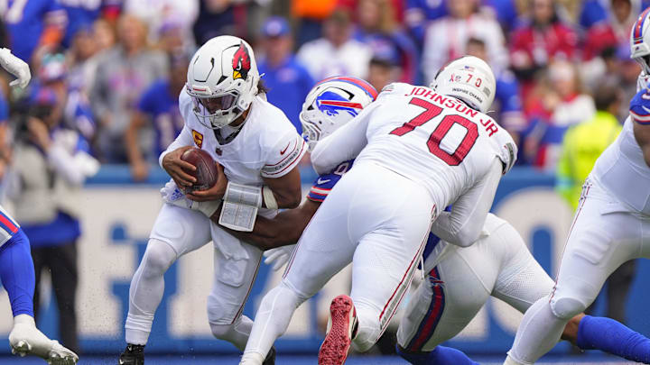 Sep 8, 2024; Orchard Park, New York, USA; Arizona Cardinals quarterback Kyler Murray (1) gets sacked by a Buffalo Bills defender during the second half at Highmark Stadium. Mandatory Credit: Gregory Fisher-Imagn Images