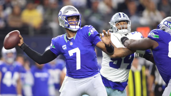 Nov 30, 2023; Arlington, Texas, USA; Seattle Seahawks quarterback Geno Smith (7) throws to pass against the Dallas Cowboys during the second half at AT&T Stadium. Mandatory Credit: Tim Heitman-USA TODAY Sports