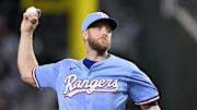 Sep 21, 2025; Arlington, Texas, USA; Texas Rangers starting pitcher Merrill Kelly (23) throws the ball during the first inning against the Miami Marlins at Globe Life Field. Mandatory Credit: Jerome Miron-Imagn Images