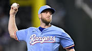 Sep 21, 2025; Arlington, Texas, USA; Texas Rangers starting pitcher Merrill Kelly (23) throws the ball during the first inning against the Miami Marlins at Globe Life Field. Mandatory Credit: Jerome Miron-Imagn Images
