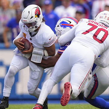 Sep 8, 2024; Orchard Park, New York, USA; Arizona Cardinals quarterback Kyler Murray (1) gets sacked by a Buffalo Bills defender during the second half at Highmark Stadium. Mandatory Credit: Gregory Fisher-Imagn Images