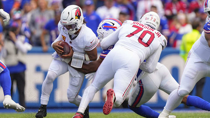 Sep 8, 2024; Orchard Park, New York, USA; Arizona Cardinals quarterback Kyler Murray (1) gets sacked by a Buffalo Bills defender during the second half at Highmark Stadium. Mandatory Credit: Gregory Fisher-Imagn Images