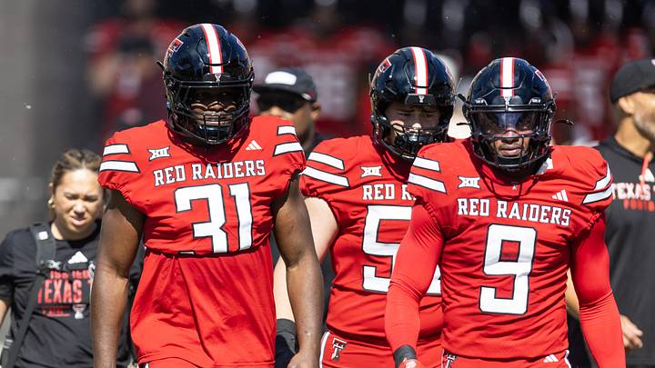 Oct 18, 2025; Tempe, Arizona, USA; Texas Tech Red Raiders linebacker David Bailey (31) and Romello Height (9) against the Arizona State Sun Devils at Mountain America Stadium. Mandatory Credit: Mark J. Rebilas-Imagn Images