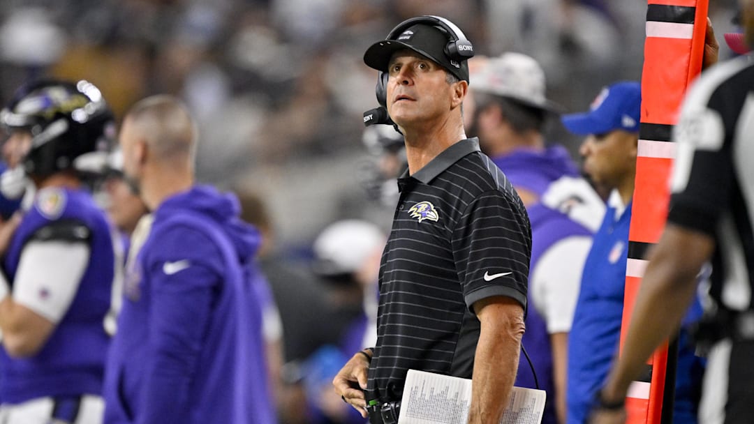 Aug 16, 2025; Arlington, Texas, USA; Baltimore Ravens head coach John Harbaugh looks on during the second half against the Dallas Cowboys at AT&T Stadium. Mandatory Credit: Jerome Miron-Imagn Images