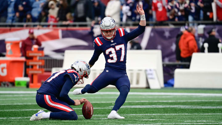 Dec 17, 2023; Foxborough, Massachusetts, USA; New England Patriots place kicker Chad Ryland (37) and punter Bryce Baringer (17)  warm up before a game against the Kansas City Chiefs at Gillette Stadium. Mandatory Credit: Eric Canha-USA TODAY Sports