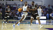 Nov 25, 2025; Fort Myers, Florida, USA; North Carolina Tar Heels forward Caleb Wilson (8) drives to the basket past St. Bonaventure Bonnies forward Daniel Egbuniwe (3) in the first half  at Suncoast Credit Union Arena. Mandatory Credit: Nathan Ray Seebeck-Imagn Images