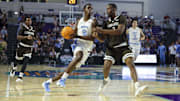 Nov 25, 2025; Fort Myers, Florida, USA; North Carolina Tar Heels forward Caleb Wilson (8) drives to the basket past St. Bonaventure Bonnies forward Daniel Egbuniwe (3) in the first half  at Suncoast Credit Union Arena. Mandatory Credit: Nathan Ray Seebeck-Imagn Images