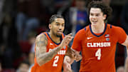 Feb 22, 2025; Dallas, Texas, USA; Clemson Tigers guard Dillon Hunter (2) and forward Ian Schieffelin (4) celebrate during the second half against the SMU Mustangs at Moody Coliseum. 