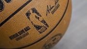 A view of an NBA basketball and the NBA logo before the game between the Dallas Mavericks and the Toronto Raptors at the American Airlines Center.